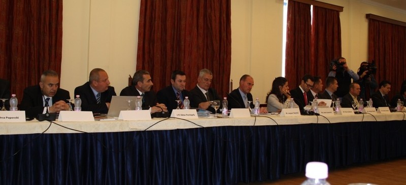 Senior military officers and munitions experts from throughout South East Europe discussing practices on stockpile reduction of unstable and excess conventional weapons and munitions
